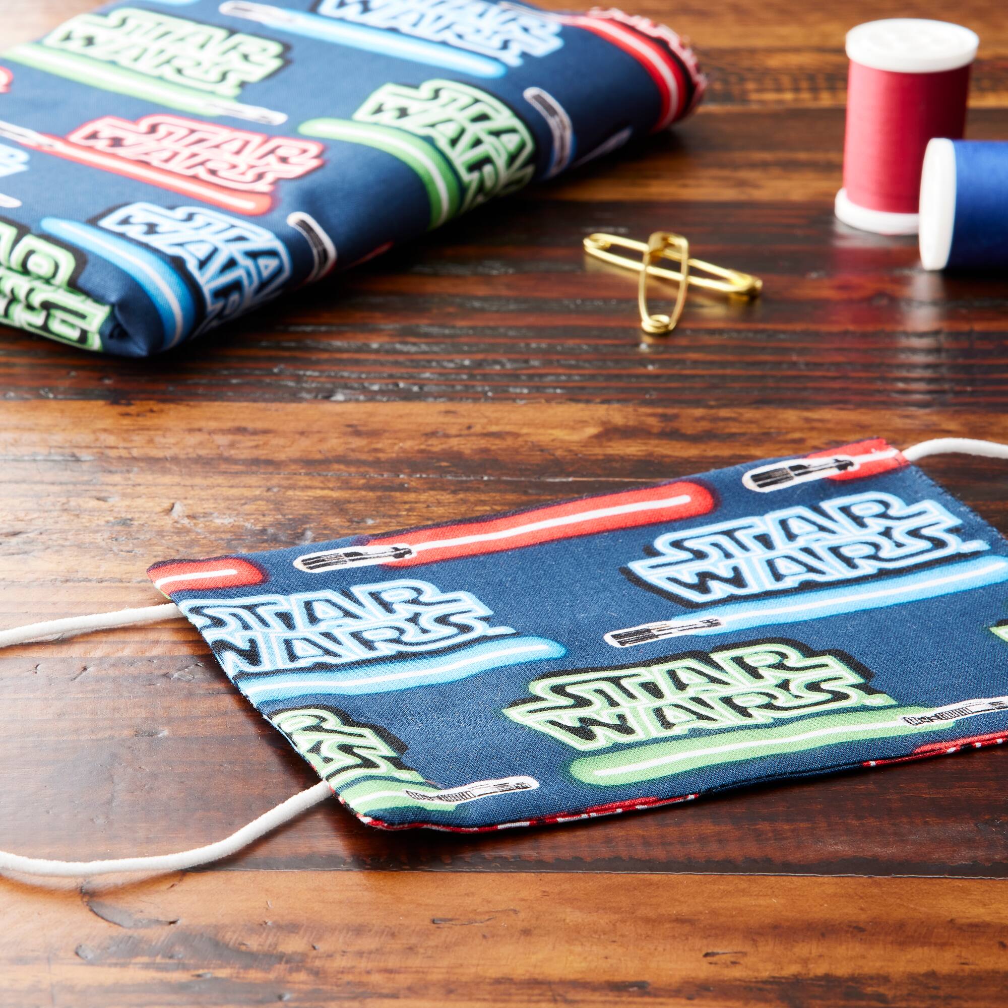 Camelot® Fabrics Star Wars™ Logo & Lightsaber™ Stripes Cotton Fabric
